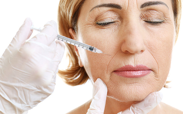 hyaluronzuur injectie voor gezichtsverjongingsprocedure